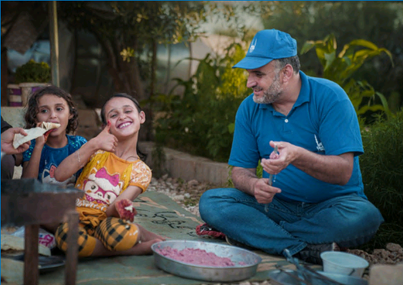 Man helping children