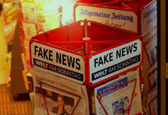 News stand with “fake news“ written at the top