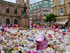 St. Ann’s square in Manchester covered with a sea of flowers in the wake of the attack.