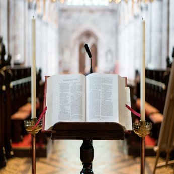 A picture of a bible on a stand