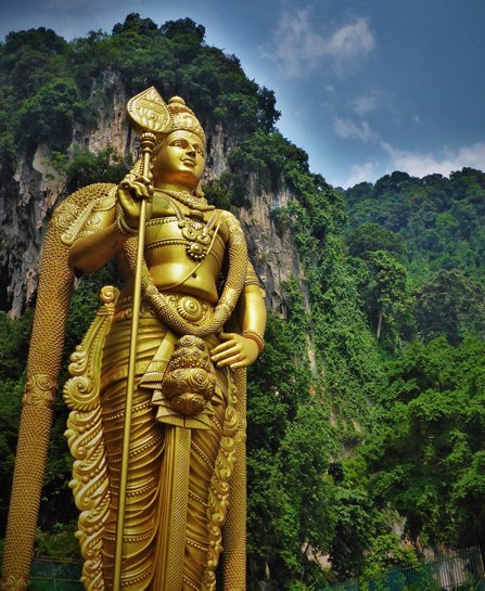 A large, gold Hindu statue in Malaysia