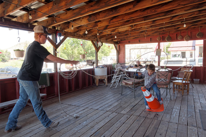 A dad and his son playing at the Ola Inn.