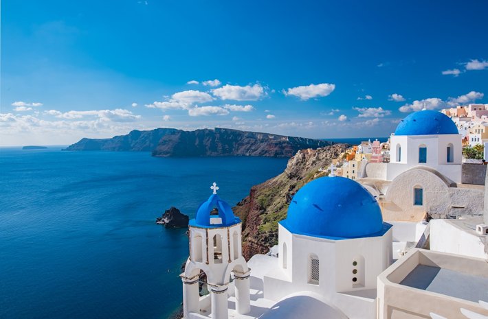 A Greek church on the shore.