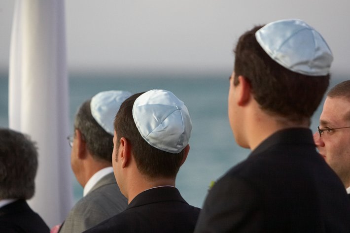 Young men wearing yarmulkes