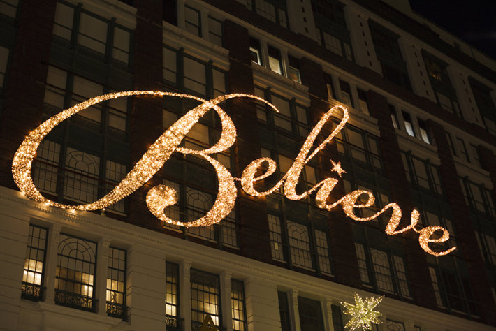 A photo of the word Believe on a building