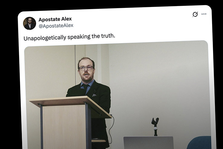 Alex Barnes-Ross at the podium