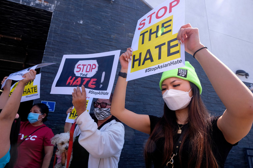 Women holding signs