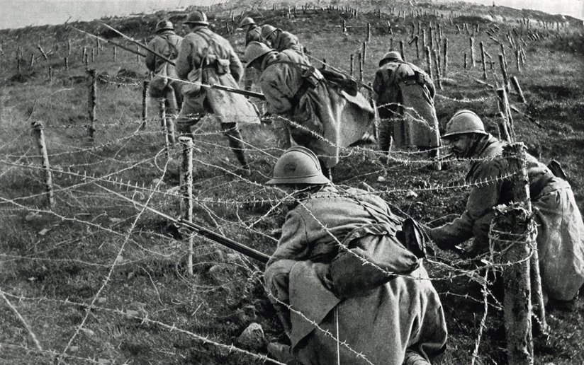 French soldiers walking with weapons