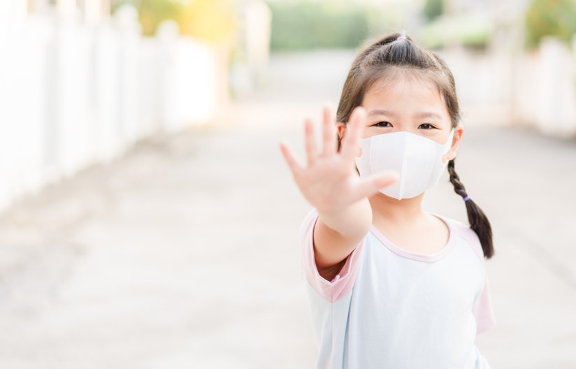 Little girl in mask