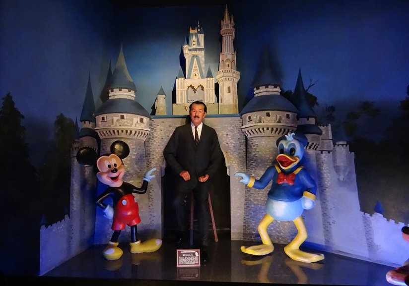 A representation of Walt Disney with Disney characters