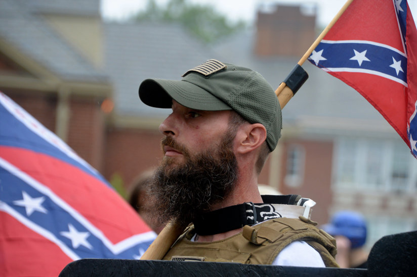 White supremacist with confederate Flag