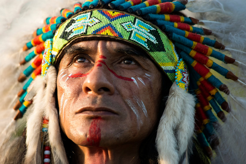 Man with Native American headdress