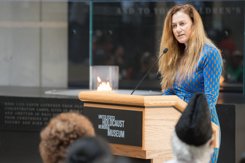 Woman speaking at podium