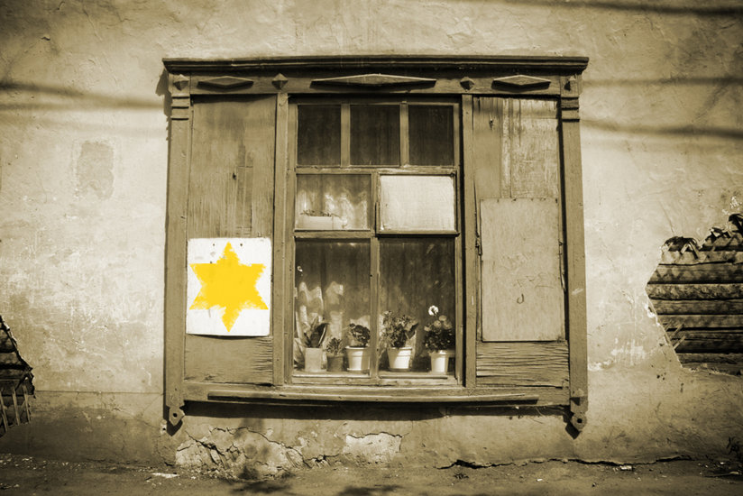 A yellow star on a building 