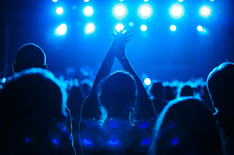 Fan in a crowd