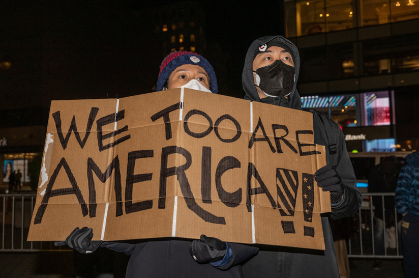 Couple with a sign