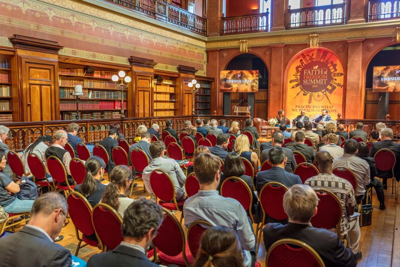 Faith and Freedom Summit panel with conference attendees