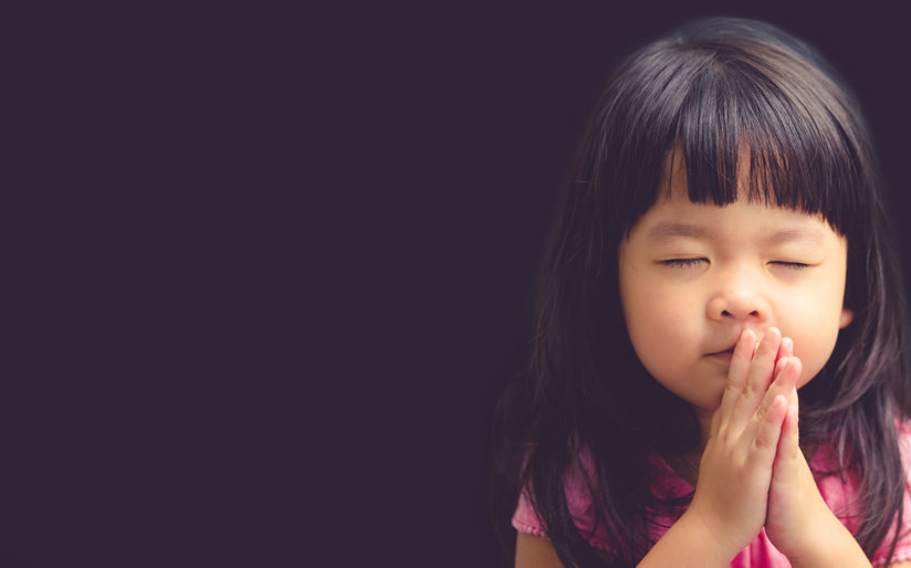 Little girl praying