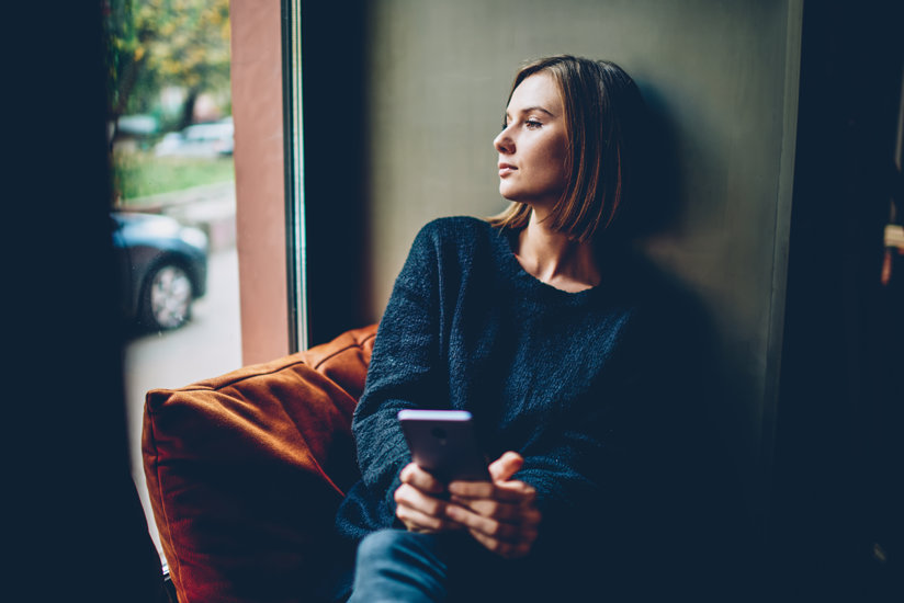 Woman looking out the window