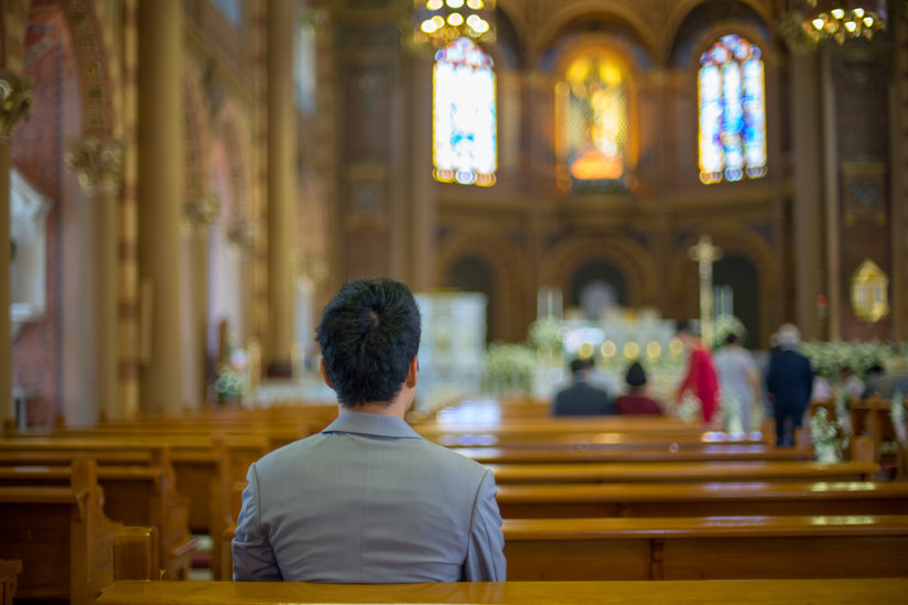 Person in church pew