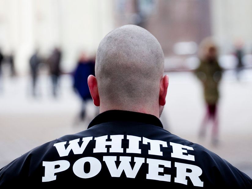 A man with a White Power jacket
