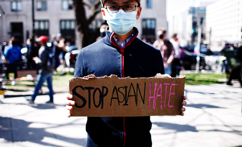 Man holding sign