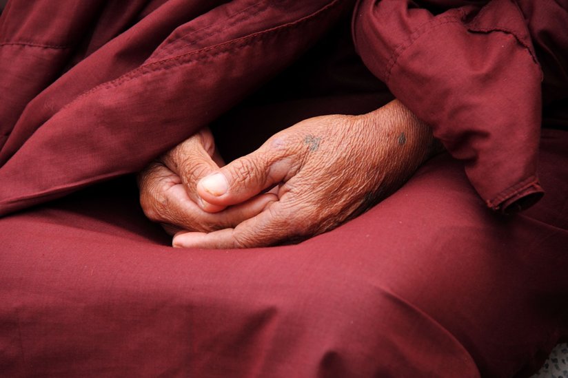 A monk’s hands in prayer