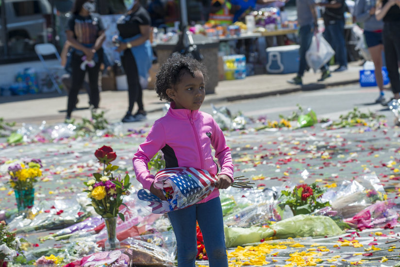 Little girl holding flowers