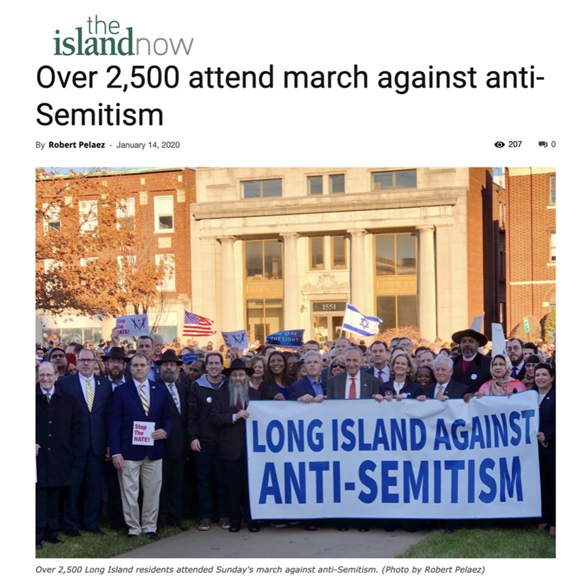 Group holding sign