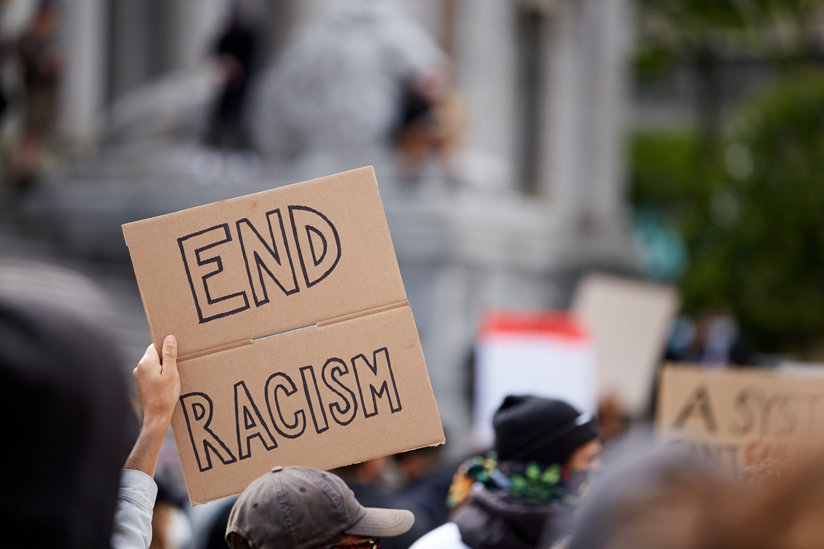 Man holding sign at protest