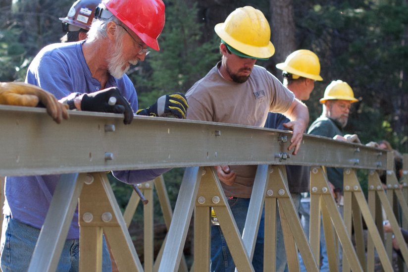 Group working on bridge